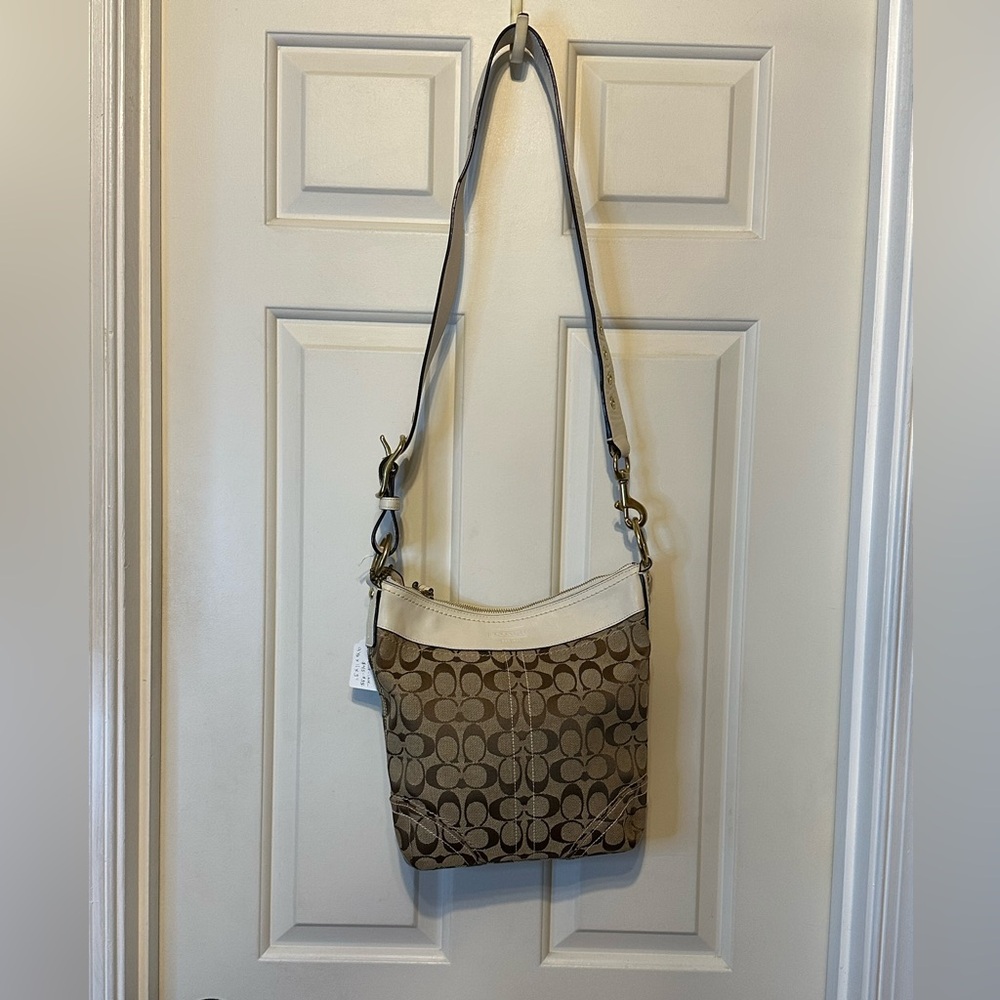 Coach Logo w/cream leather trim shoulder or crossbody handbag.